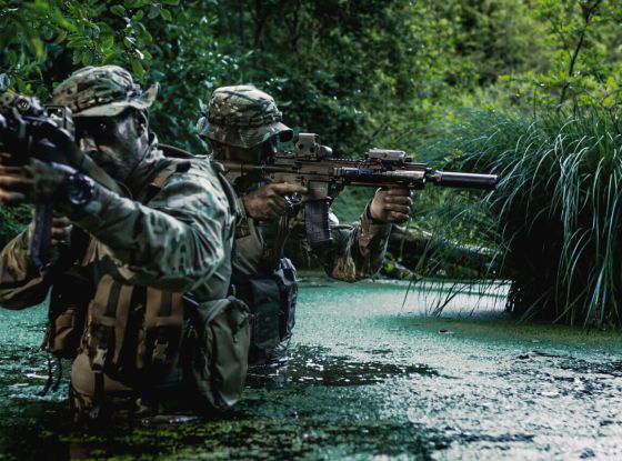 Close-up of a soldier’s camouflage, mimicking jungle textures and patterns for maximum concealment.