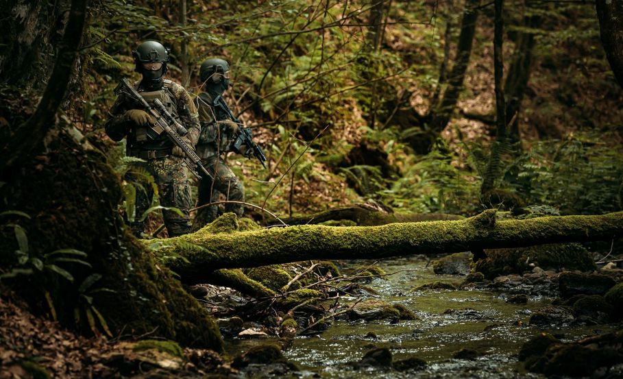 Two operators holding firearms, in full tactical camouflage gear Why Some Tactical Camouflage Works and Others Don’t